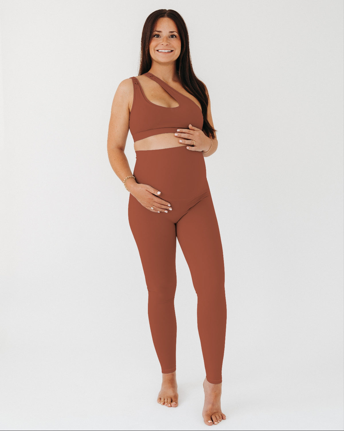 Brown AXK one-shoulder maternity and nursing sports bra. Paired with matching high-waist leggings, this premium maternity workout set is available in plus size, tall friendly, and petite friendly sizing. Premium maternity activewear and athleisure by AXK.